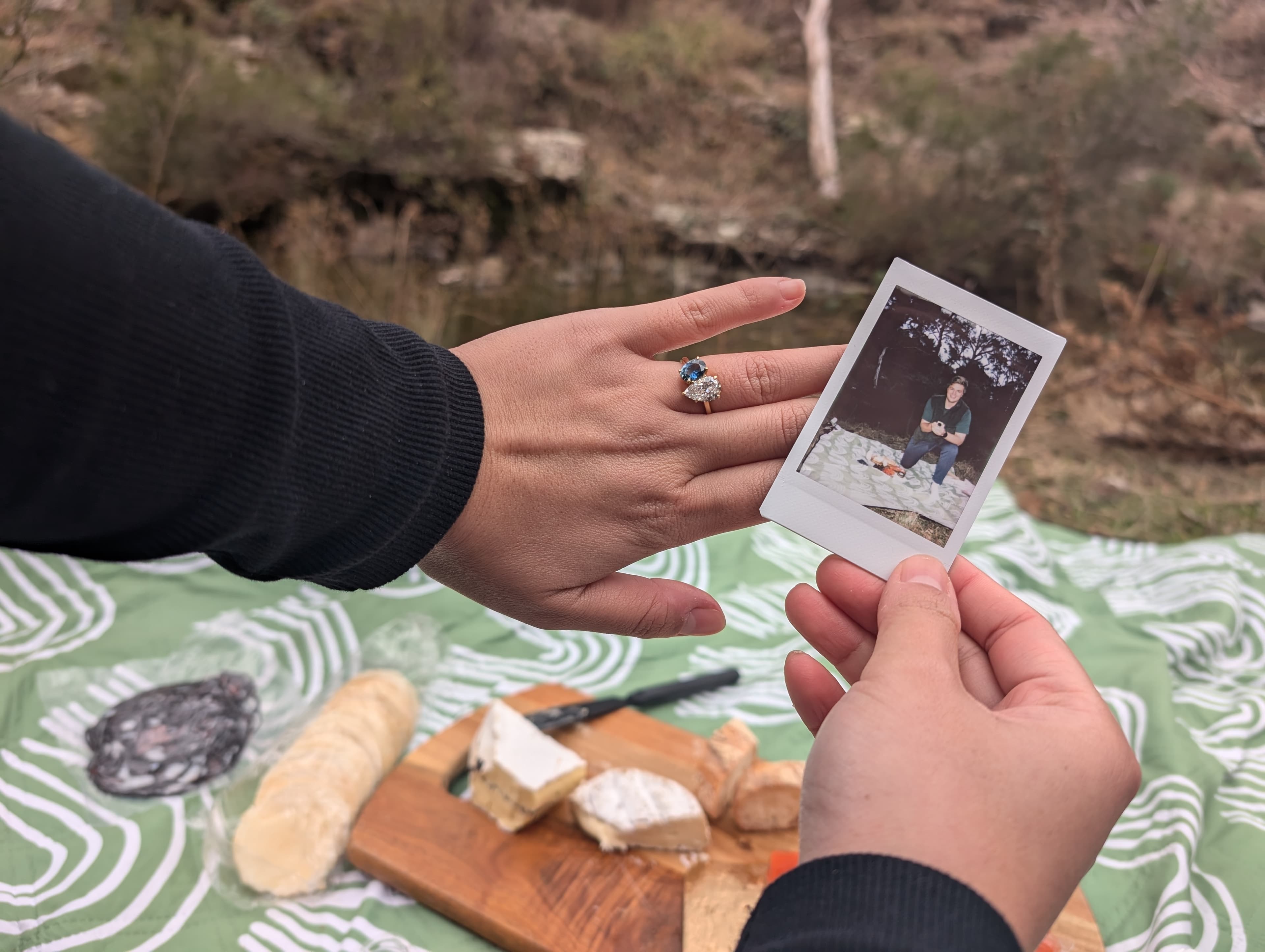 Engagement ring reveal captured in polaroid style